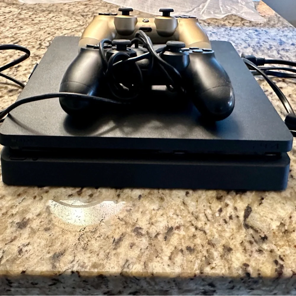 PlayStation PS4 Console with Gold and Black Controllers and 7 Physical Games